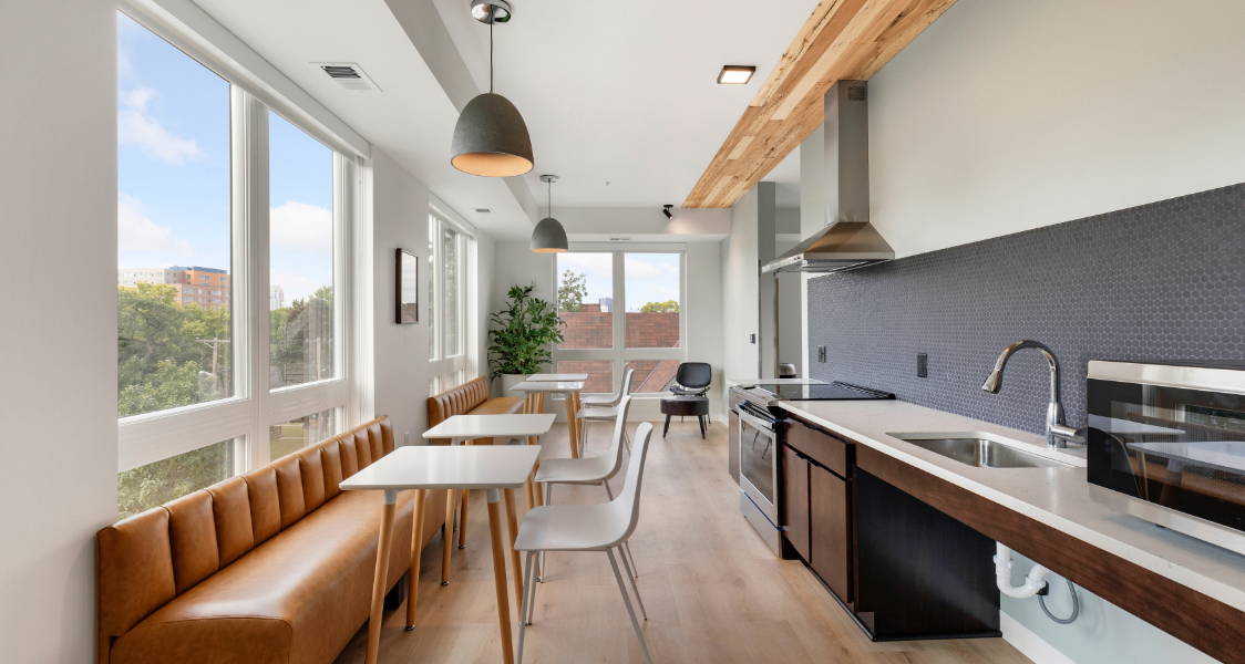 trademark minneapolis shared space seating and kitchen area