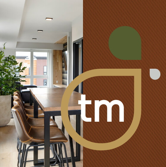 a branded image of the seating in the common area at Trademark in Dinkytown